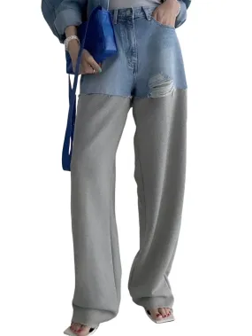 Blue jeans detail and gray pants